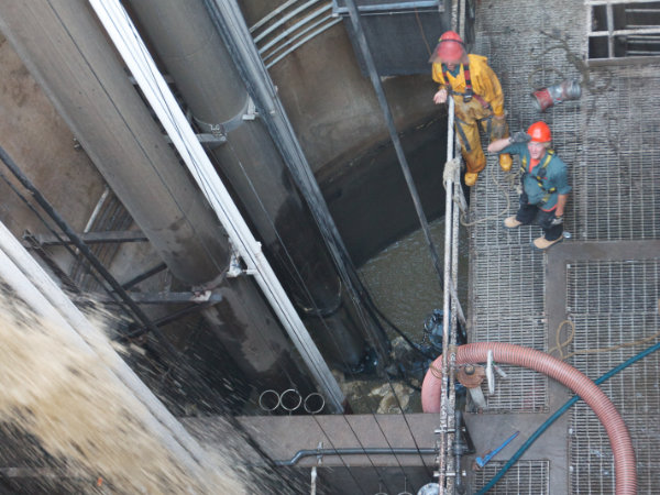 Two staff in a pumping station